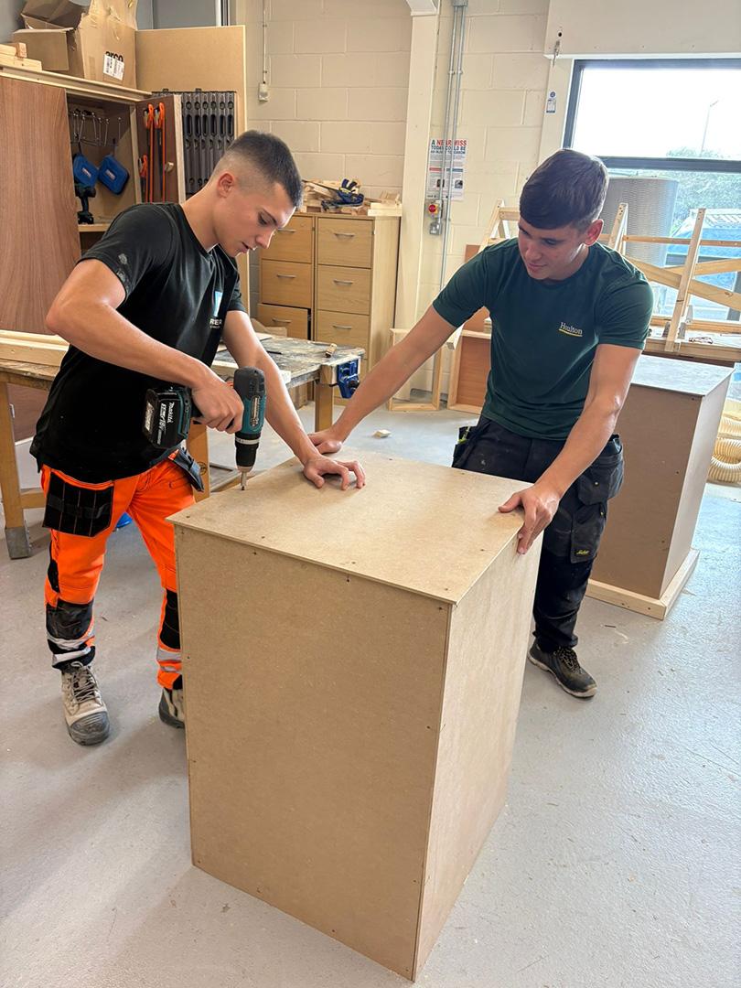 Hull Children’s University Charity Ball 2025, DoubleTree Hilton Hull, book-themed props created by our Signmaking, Joinery, and Carpentry apprentices in collaboration with Hobson & Porter