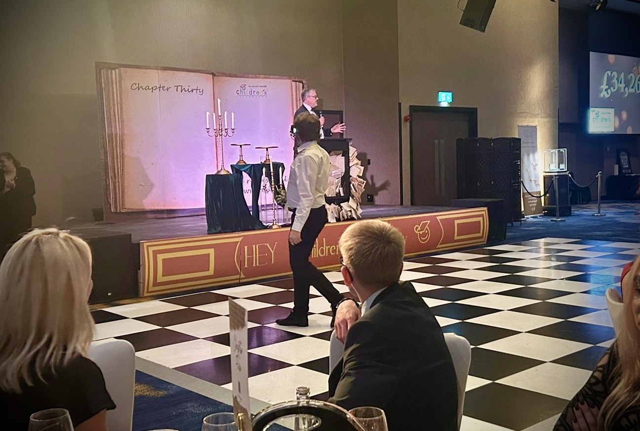 Hull Children’s University Charity Ball 2025, DoubleTree Hilton Hull, book-themed props created by our Signmaking, Joinery, and Carpentry apprentices in collaboration with Hobson & Porter