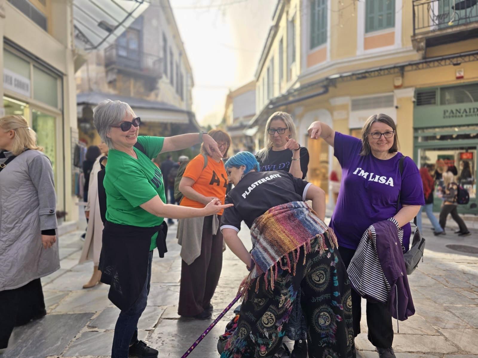 A photograph of the team taken on the streets of Athens