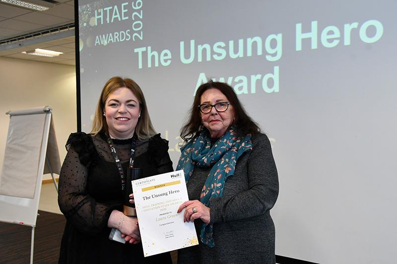 The unsung hero award winner laura green presented by cllr linda tock