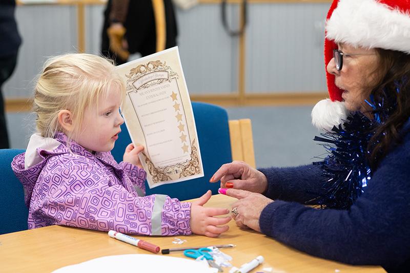 Cllr Tock with a child