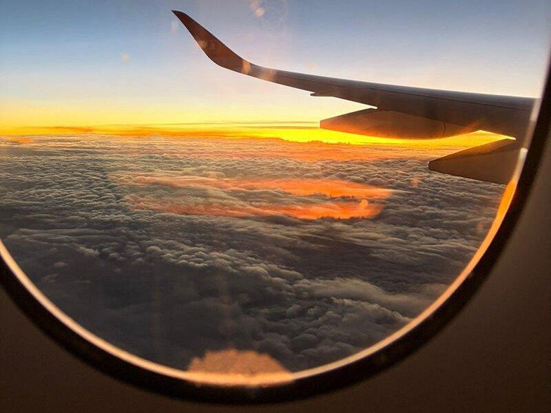 Clouds through the window of a plane